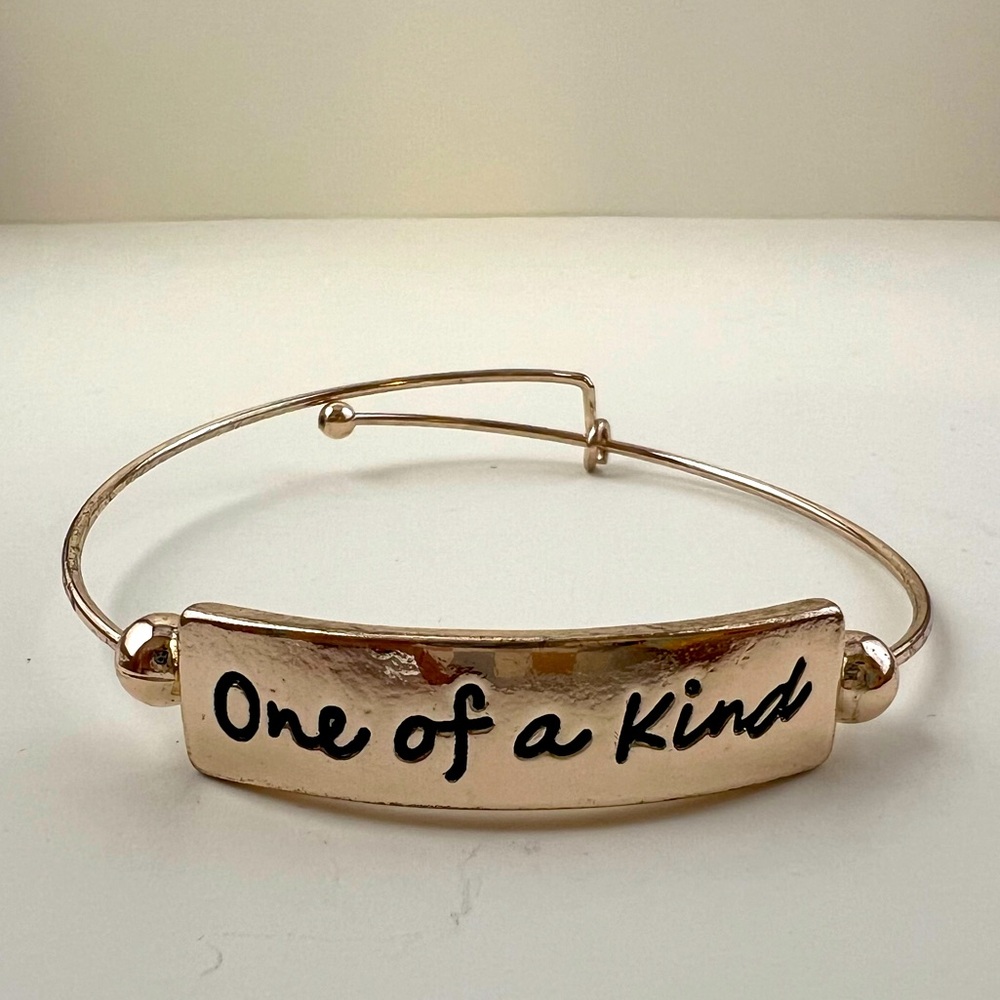 Rose Gold Tone “One of a Kind” Bangle Bracelet